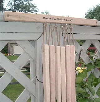 Sticks hanging from a custom hanger.