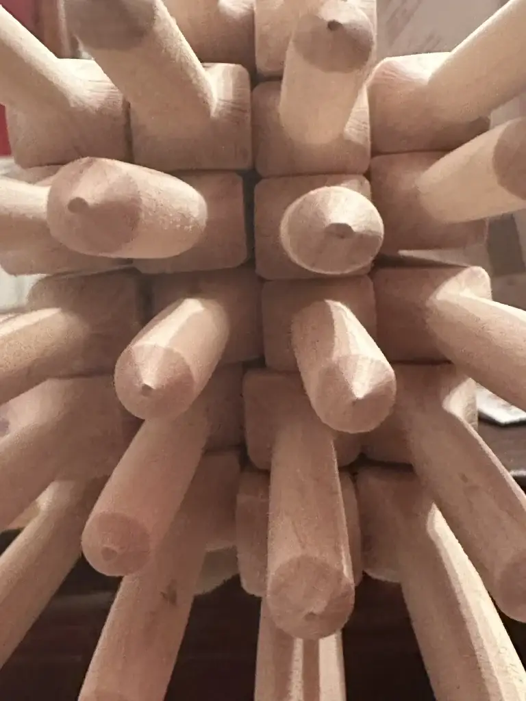 Sticks pointing toward the camera.