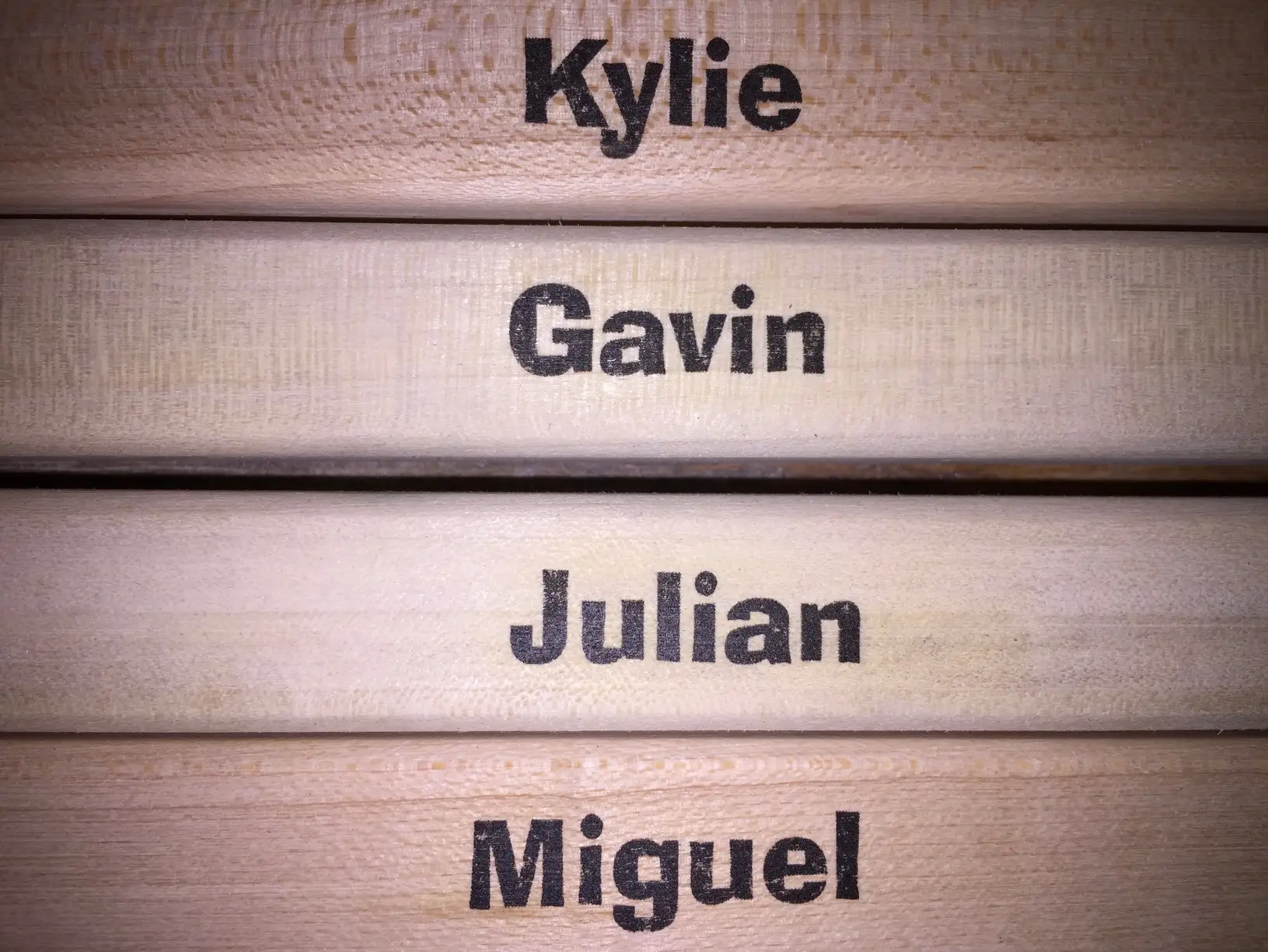 Four personalized sticks with names: Kylie, Gavin, Julian Miguel
